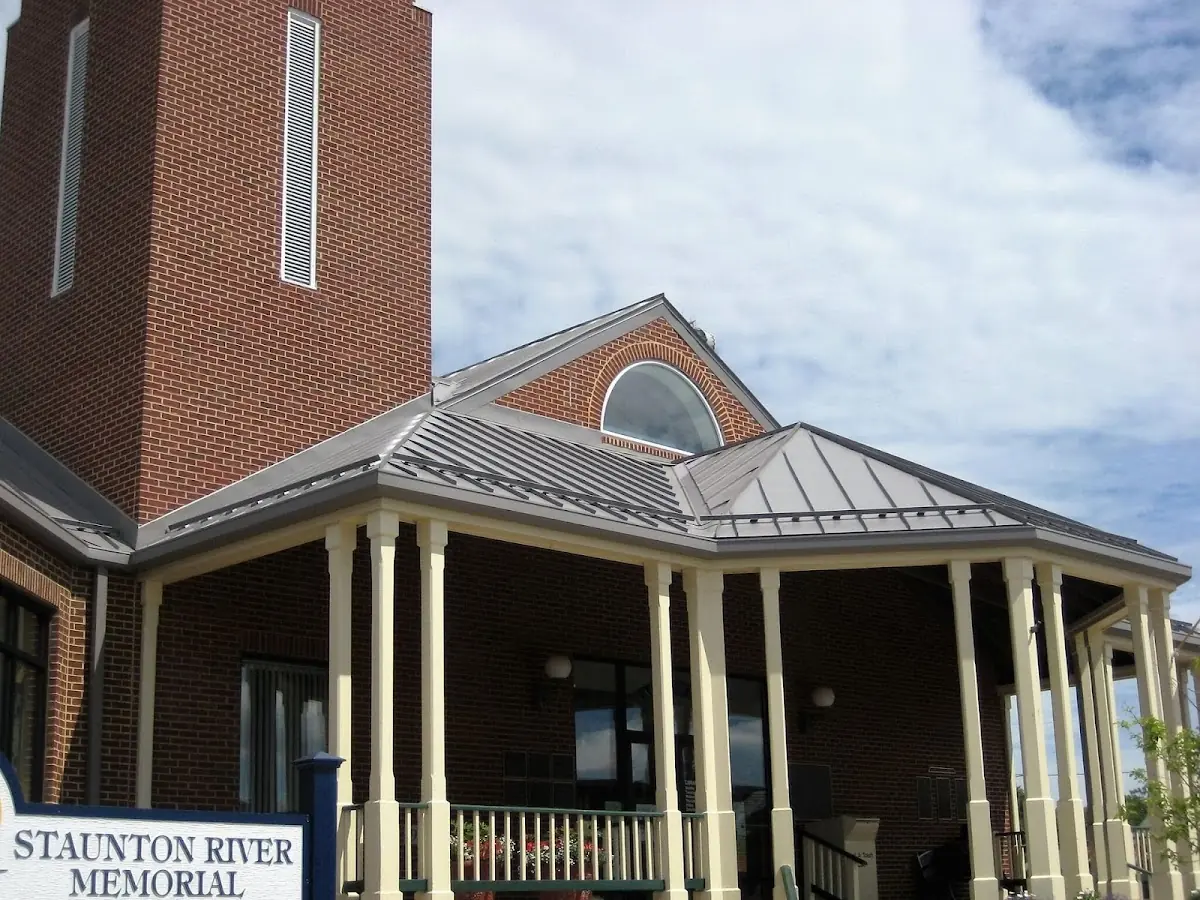 Skilled roofing craftsmen working on a residential roof in Lafayette Square